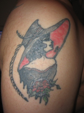Edit: Picture of the tattoo. Not very horror, but still a fanged vampire 